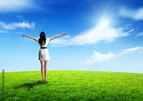 Photo: field of grass and happy young woman field of grass and happy young woman