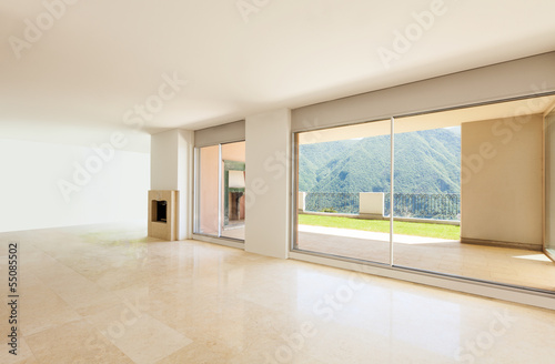 Photo: Interior apartment with garden, large room with windows Interior apartment with garden, large room with windows