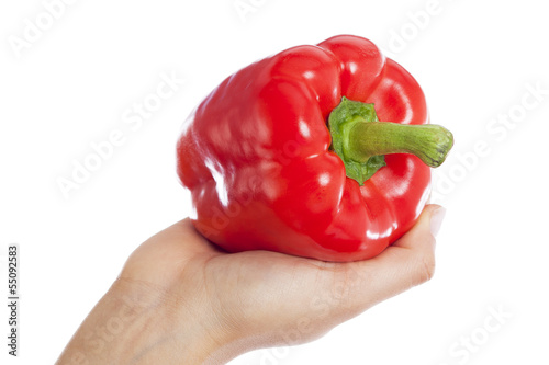 Photo: Hand holding a red pepper Hand holding a red pepper