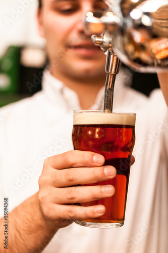 Photo: Man drawing a beer Man drawing a beer