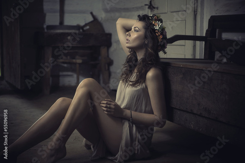 Photo: Shapely young brunette in old interior Shapely young brunette in old interior