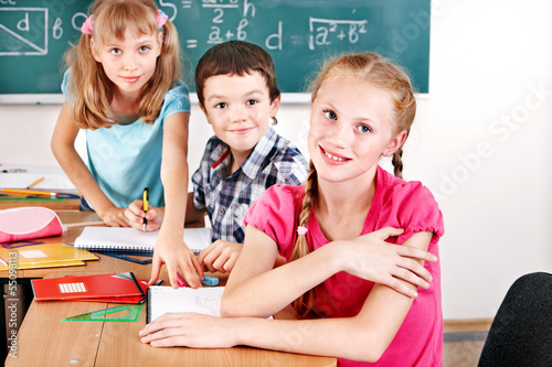 Photo: School children girl and boy. School children girl and boy.