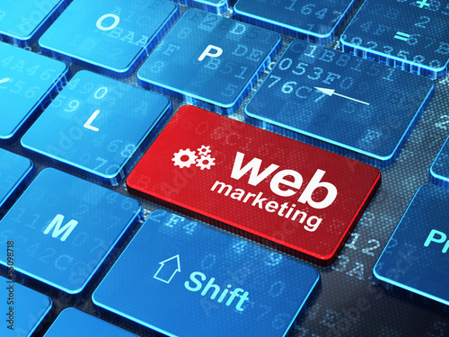 Illustration: Web design concept: Gears and Web Marketing on computer keyboard Web design concept: Gears and Web Marketing on computer keyboard