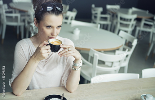 Photo: Alluring brunette lady taking a break Alluring brunette lady taking a break
