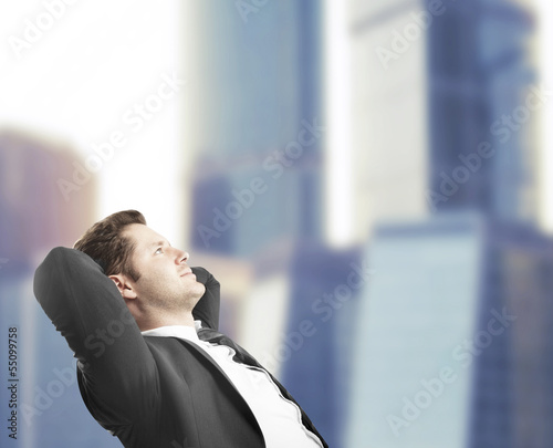 Photo: man sitting in office man sitting in office