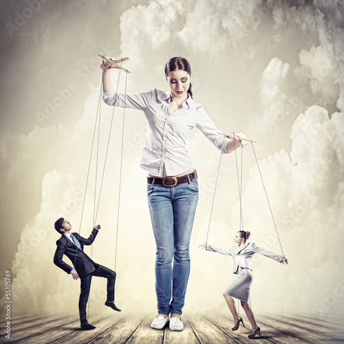 Photo: Businesswoman puppeteer Businesswoman puppeteer