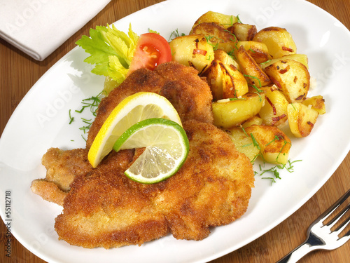 Photo: Schnitzel mit Bratkartoffeln Schnitzel mit Bratkartoffeln