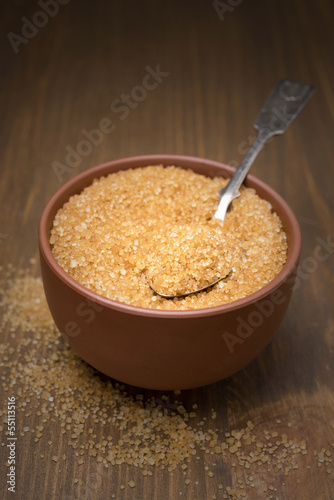 Photo: brown sugar in a bowl, selective focus brown sugar in a bowl, selective focus