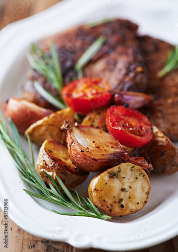 Photo: Close up of grilled vegetables with meat on a plate Close up of grilled vegetables with meat on a plate