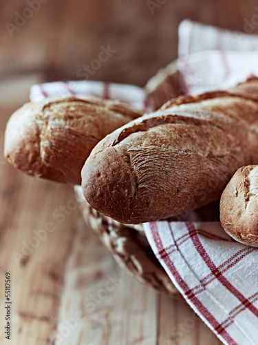 Photo: Close up of baguettes in a basket Close up of baguettes in a basket