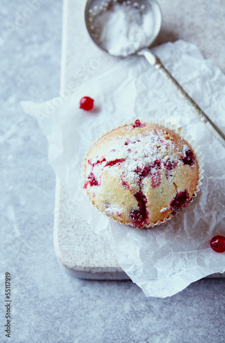 Photo: Red currant muffin dusted with icing sugar Red currant muffin dusted with icing sugar