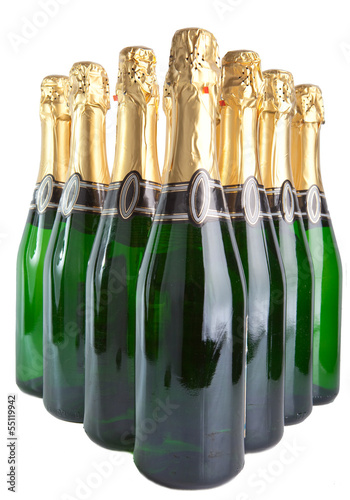 Photo: Sparkling wine bottles on a white background Sparkling wine bottles on a white background