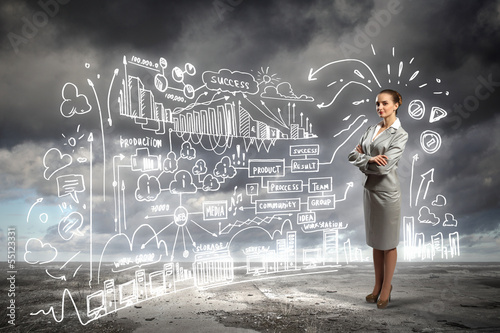 Photo: Business woman and business project Business woman and business project
