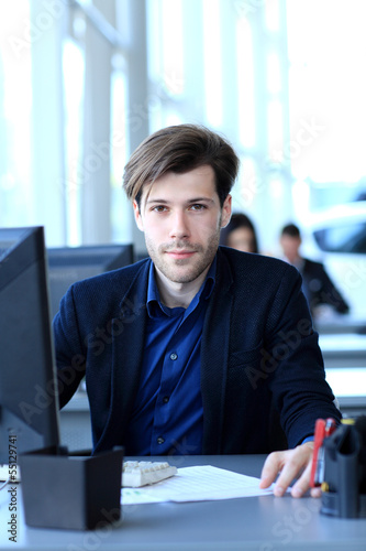 Photo: Businessman using laptop Businessman using laptop
