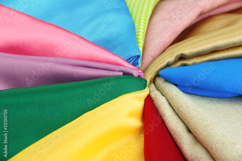 Photo: heap of cloth fabrics, close up heap of cloth fabrics, close up