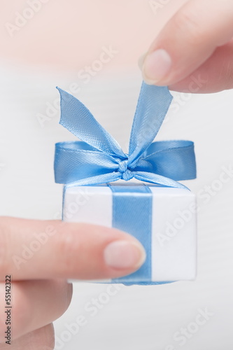 Photo: Box with gift in their hands Box with gift in their hands