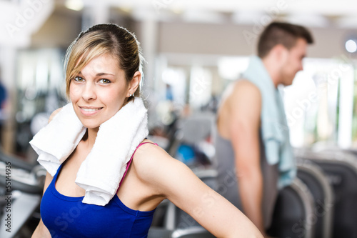 Photo: Beautiful girl in a fitness club Beautiful girl in a fitness club