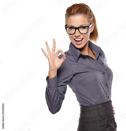 Photo: Happy smiling business woman with thumbs up gesture Happy smiling business woman with thumbs up gesture