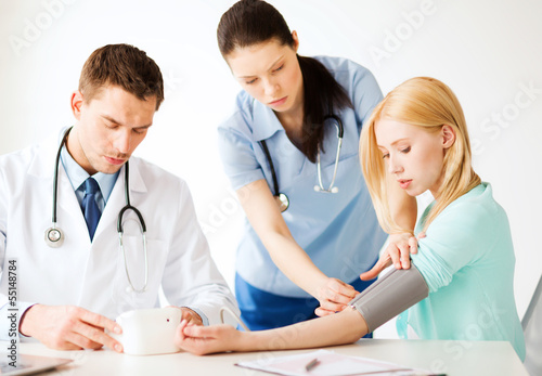 Photo: doctor and patient in hospital doctor and patient in hospital