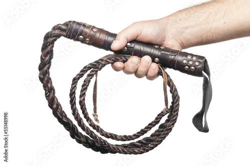 Photo: male hand holding brown leather whip isolated on white backgroun male hand holding brown leather whip isolated on white backgroun