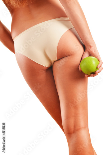 Photo: Slim woman's body isolated on white background Slim woman's body isolated on white background