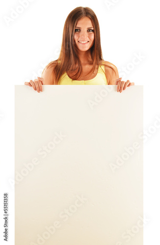 Photo: Young smiling woman holding a blank board isolated on white Young smiling woman holding a blank board isolated on white