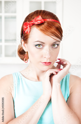 Photo: Portrait of stylish beautiful woman with red hair Portrait of stylish beautiful woman with red hair