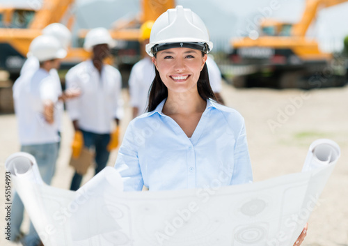 Photo: Female architect at a construction site Female architect at a construction site