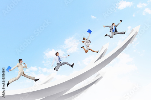 Photo: Businesspeople jumping Businesspeople jumping