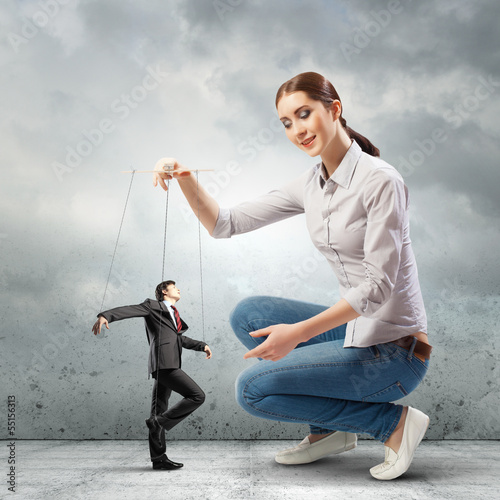 Photo: Businesswoman puppeteer Businesswoman puppeteer