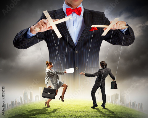 Photo: Businessman puppeteer Businessman puppeteer