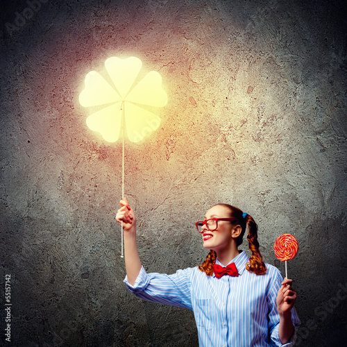 Photo: Teenager girl with candy Teenager girl with candy