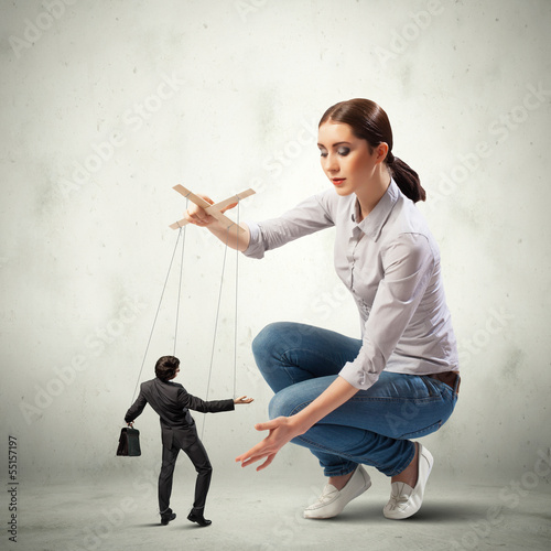 Photo: Businesswoman puppeteer Businesswoman puppeteer