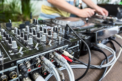 Photo: Dj mixes the track in club Dj mixes the track in club