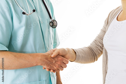 Photo: Doctor's and patient's handshake Doctor's and patient's handshake