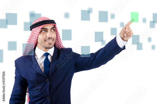 Photo: Arab man pressing virtual buttons Arab man pressing virtual buttons