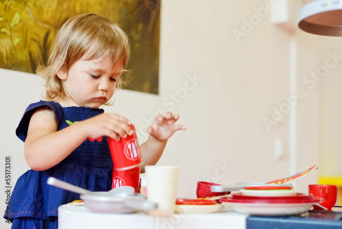 Photo: toddler girl is playing toddler girl is playing