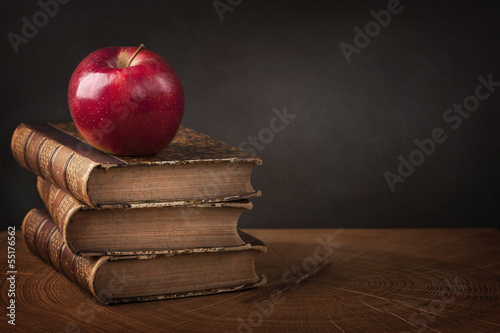 Photo: Stack of books and red apple Stack of books and red apple