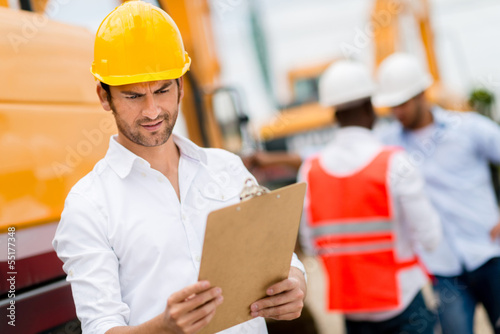 Photo: Architect at a construction site Architect at a construction site
