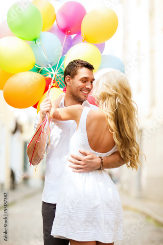 Photo: couple with colorful balloons couple with colorful balloons