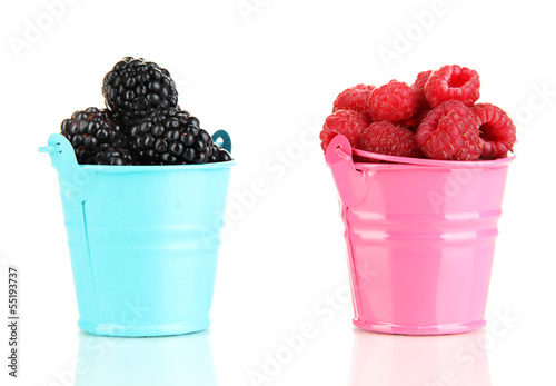 Photo: Ripe raspberries and blackberries in pail isolated on white Ripe raspberries and blackberries in pail isolated on white