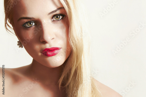 Photo: Beautiful blond woman with red lips. your text here Beautiful blond woman with red lips. your text here