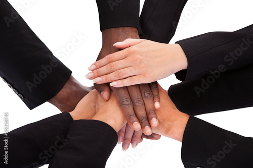 Photo: Businesspeople Stacking Hands Businesspeople Stacking Hands