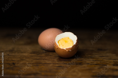 Photo: Eggs on wooden table Eggs on wooden table