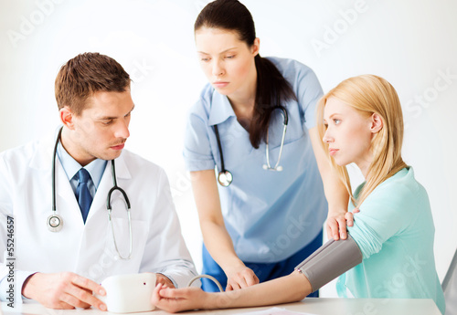 Photo: doctor and patient in hospital doctor and patient in hospital