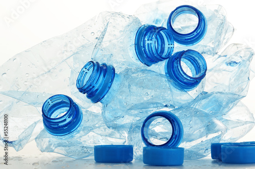 Photo: Composition with empty polycarbonate plastic bottles of mineral Composition with empty polycarbonate plastic bottles of mineral