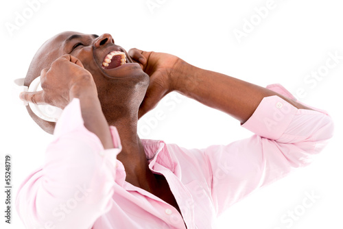 Photo: Happy man listening to music Happy man listening to music