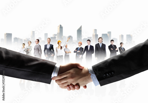 Photo: image of business handshake image of business handshake