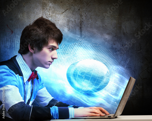 Photo: Businessman using laptop Businessman using laptop