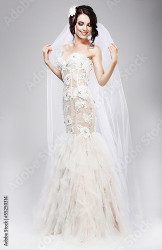 Photo: Expectation. Beautiful Jubilant Bride in White Wedding Dress Expectation. Beautiful Jubilant Bride in White Wedding Dress